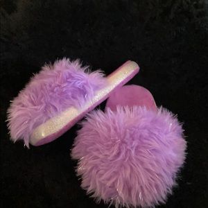 Purple fuzzy slippers
